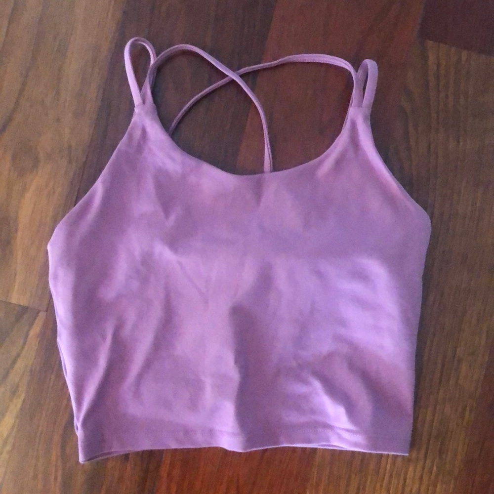 Athletic small supportive pink crop top with crossed straps